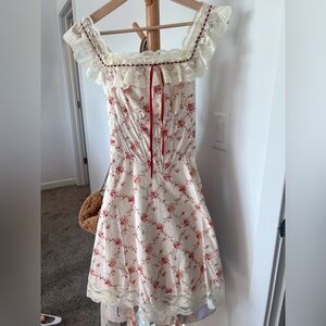 Ivory floral dress with lace trim and ribbon tie, lightweight